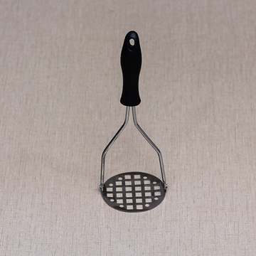 Potato masher with plastic handle and square box hole